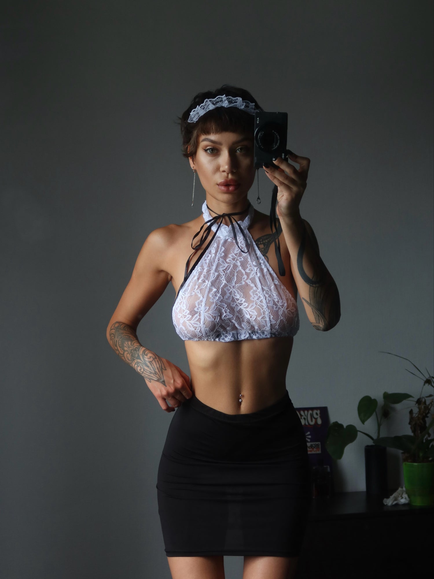 Sexy French Maid lingerie set by Brown Hercules, featuring a classic black maid costume with lace and ruffle details for women.