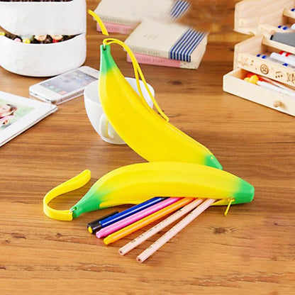 Fuchsia Molly banana design wallet with yellow banana print, compact and stylish accessory for everyday use.
