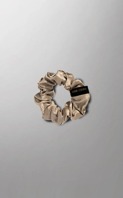 Silk hair ties in gray, golden, and white from Burgundy Clover, featuring M and L sizes, displayed on a neutral background.