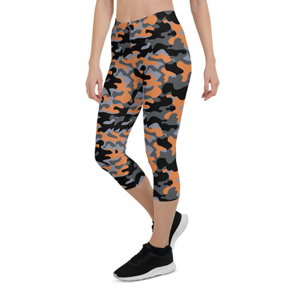 Orange and gray camo Capri leggings for women, Maroon Sooty activewear, showing the patterned stretch fabric and comfortable fit.