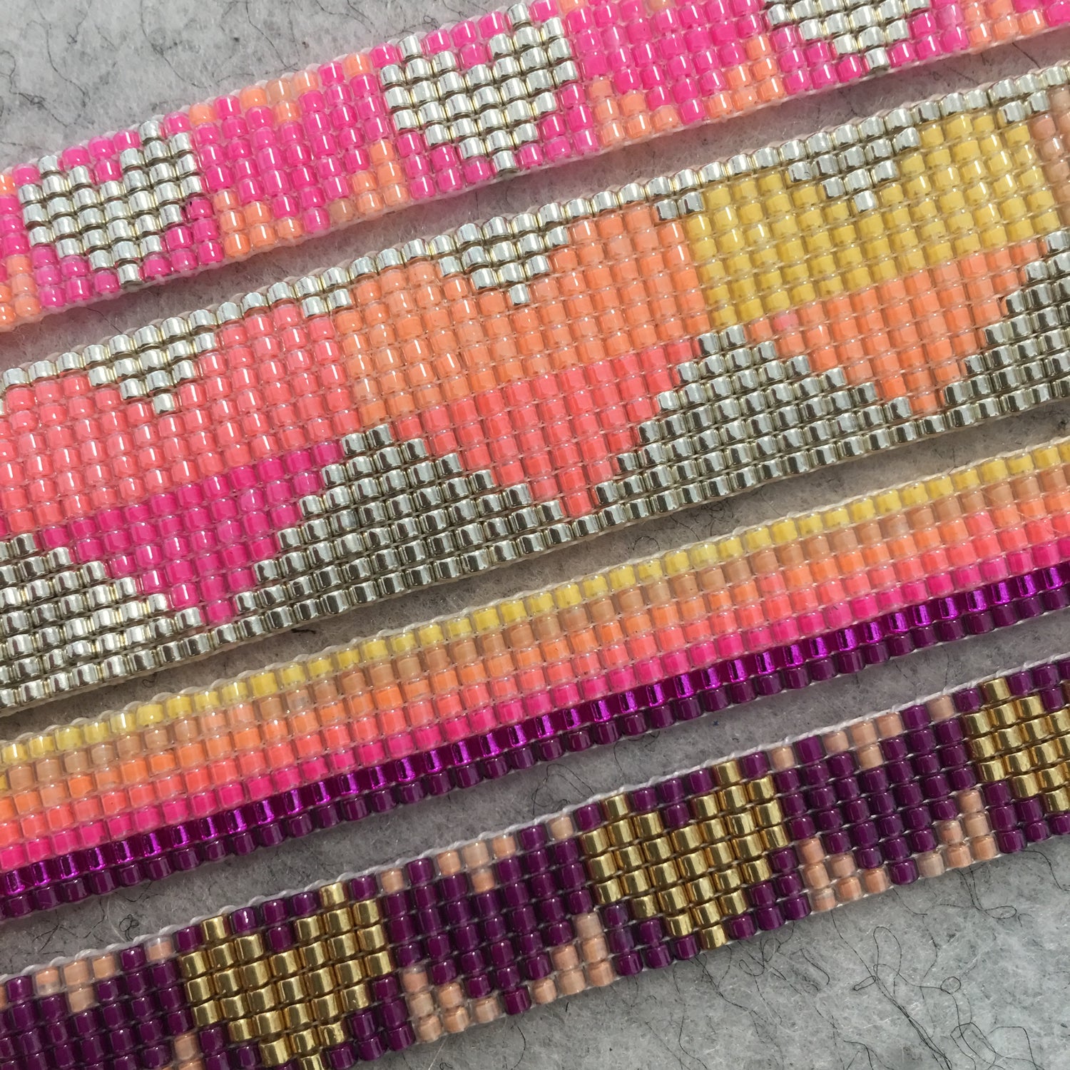 Colorful Rainbow Heart Bracelets by Yellow Athena featuring vibrant rainbow beads and heart charms on stretchy elastic band