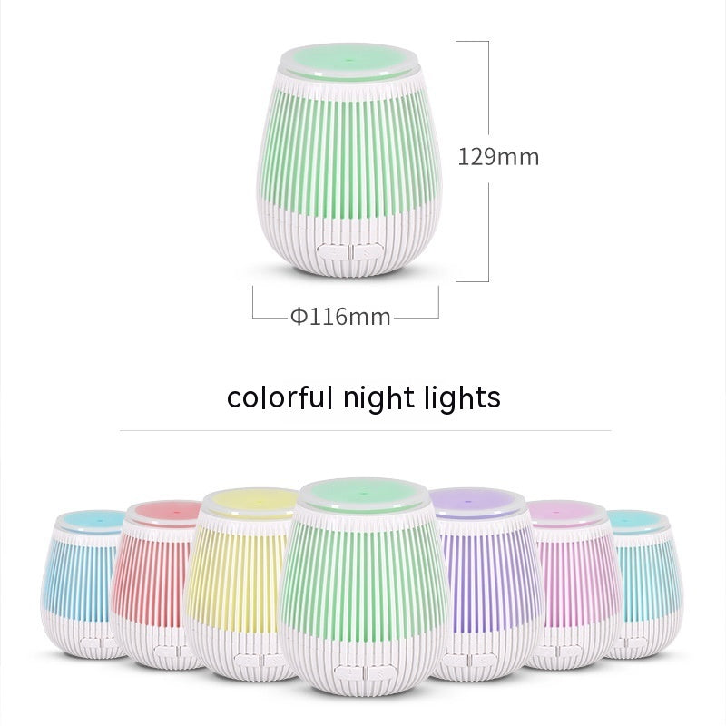 Colorful Creative USB Aromatherapy Humidifier with fragrance lamp design, used for relaxing home aromatherapy sessions.