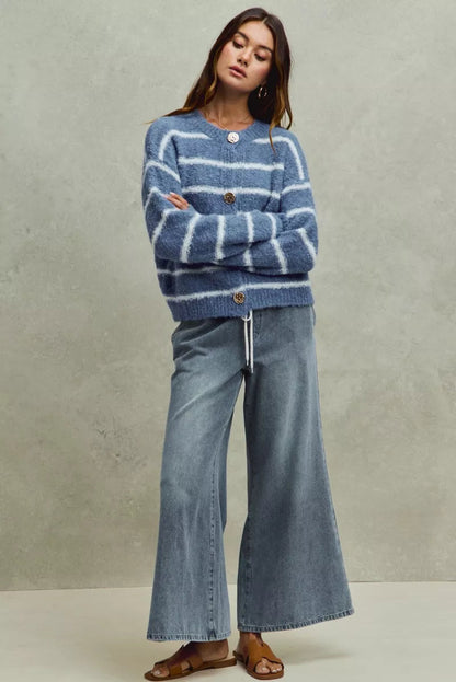 Pear Daisy SO ME mid-rise flare denim jeans with elastic waist, displayed on a neutral background.