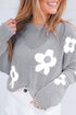Light grey Carmine Juneberry sweater with large flower hollow knit design and drop shoulder fit, cozy and stylish knit sweater.