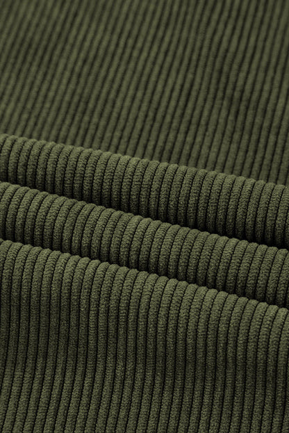 Green high waist corduroy pants with square pockets by Carmine Juneberry, showcasing a stylish, fitted design.