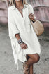 Light beige linen mini dress for women with half-button front and pocket details by Jade, casual and comfortable for everyday wear.