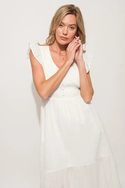 Pear Daisy ruffle sleeve front smocked tiered midi dress with floral pattern, perfect for casual and summer wear.