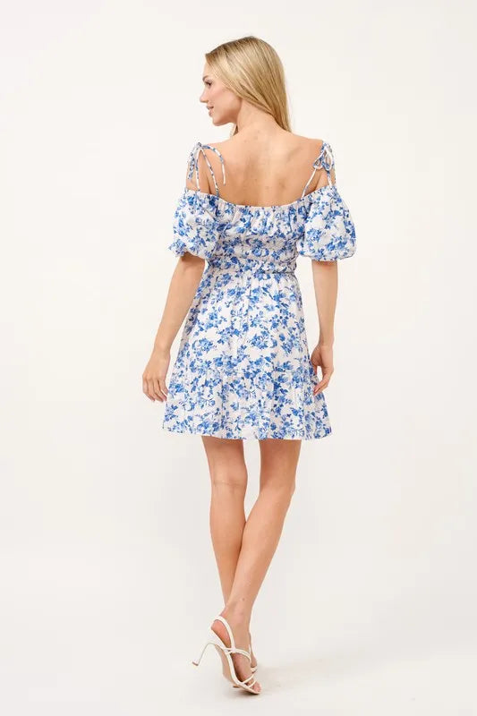 Automotive dashboard featuring Jade Icarus branded And The Why Off Shoulder Bubble Sleeve Dress design in a sleek, modern style.