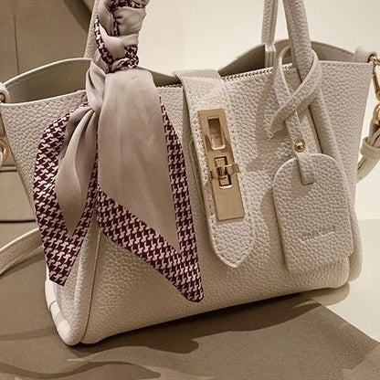 Carmine Juneberry CityEdit™ Litchi Luxe Tote with scarf handle, stylish tote bag with textured litchi pattern and elegant scarf accent.
