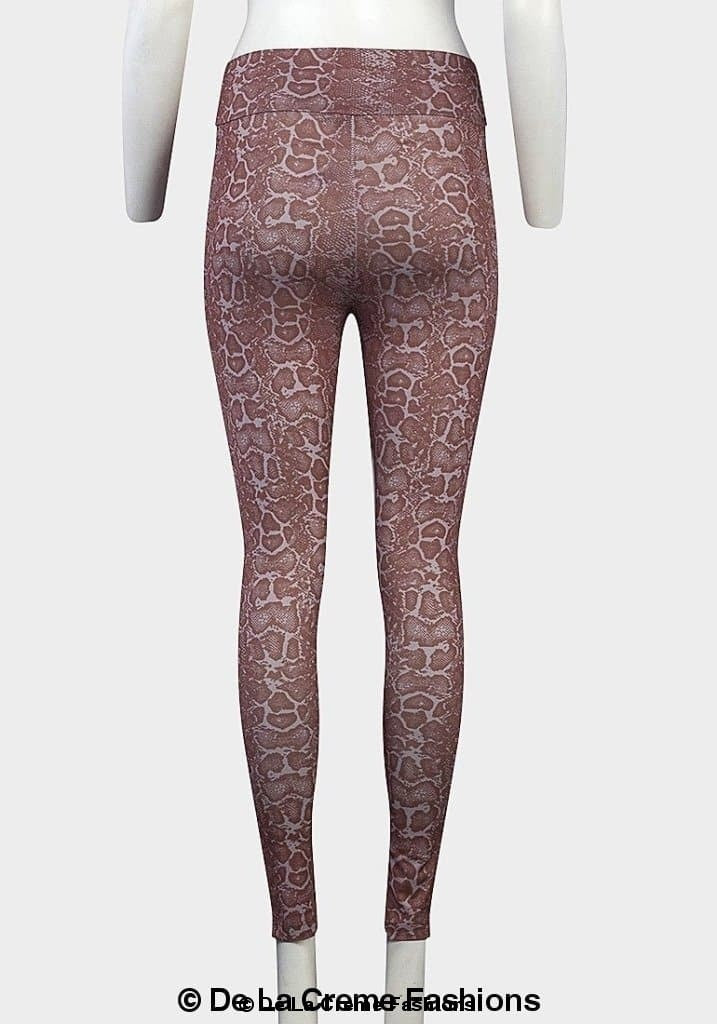 De La Creme ladies animal print leggings, stylish and comfortable, shown in a close-up of the patterned fabric.