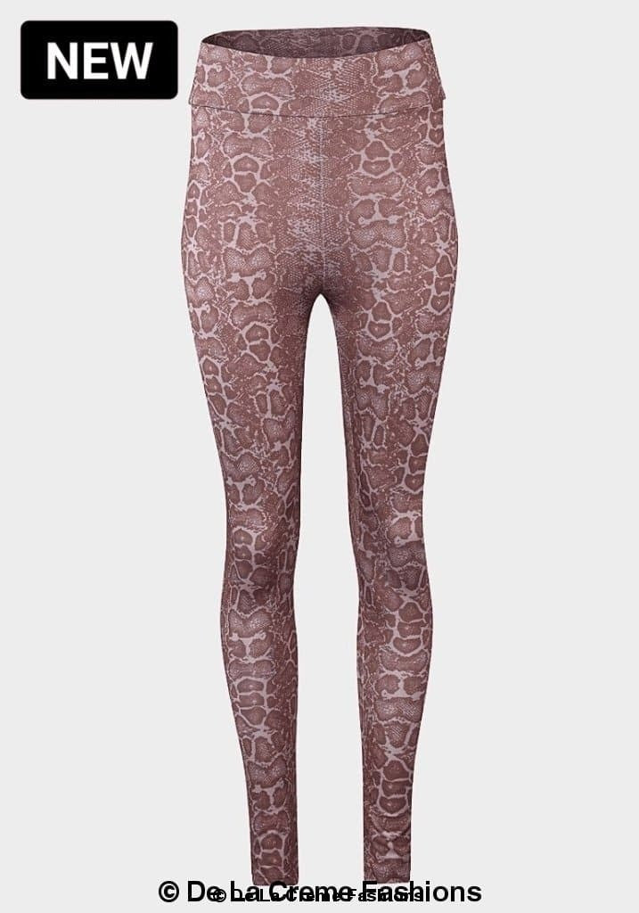 De La Creme ladies animal print leggings, stylish and fitted, featuring a bold animal pattern for trendy casual wear.