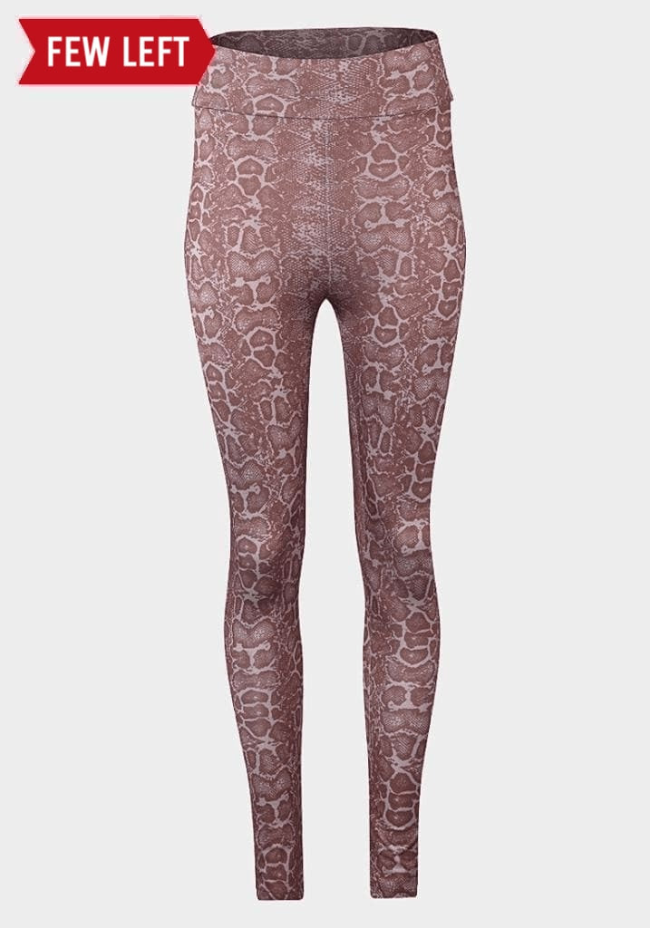De La Creme ladies animal print leggings featuring a vibrant animal pattern, styled with a comfortable fit and stylish design.