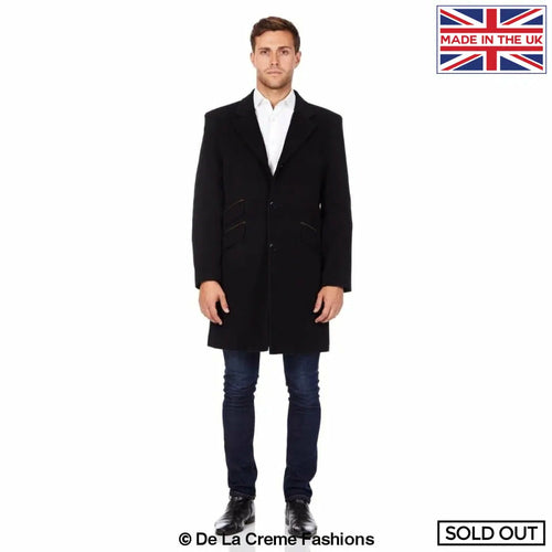 Black De La Creme MAN wool blend single-breasted retro mod coat by Rose Eleusis, shown on a hanger.