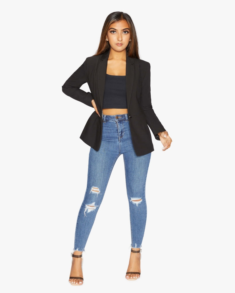 Black casual blazer for women by Rose Eleusis, tailored fit, worn open or buttoned, styled with casual or smart outfits.