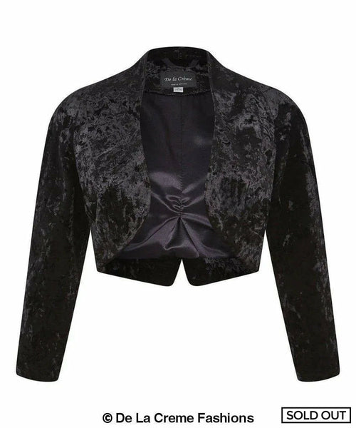 Black open-front velvet bolero shrug by Rose Eleusis, stylish jacket with long sleeves and elegant design.