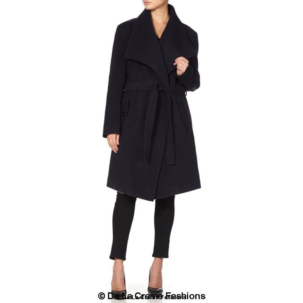 Rose Eleusis wool blend large lapel duster coat draped over a model, showcasing its length and classic lapel design.