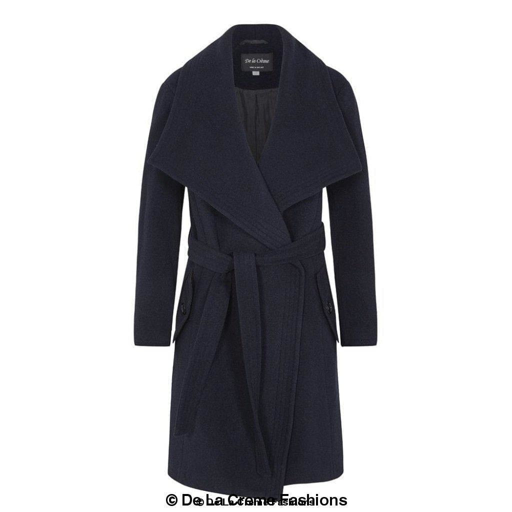 Woman wearing a Rose Eleusis wool blend large lapel duster coat, stylish long jacket with wide lapel collar.