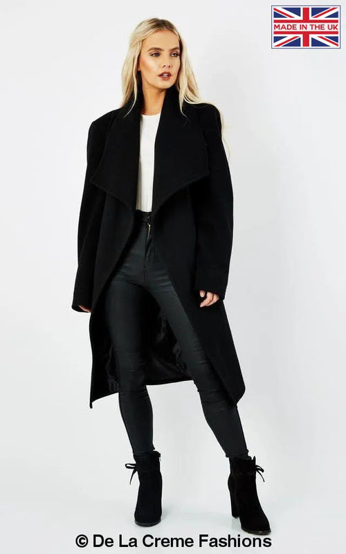 Black Wool Blend Large Lapel Duster Coat by Rose Eleusis, shown on a model, featuring a stylish, long coat with a wide lapel.