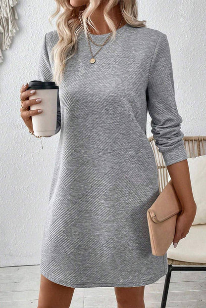 Gray Carmine Juneberry long sleeve shift dress with textured solid fabric, showcasing a relaxed, comfortable fit.
