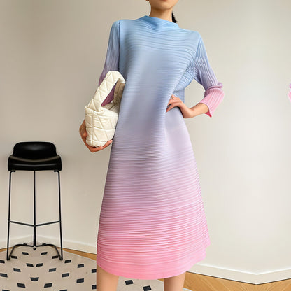 Plus size pleated dress by Carmine Juneberry featuring a flowy silhouette and elegant design for women.