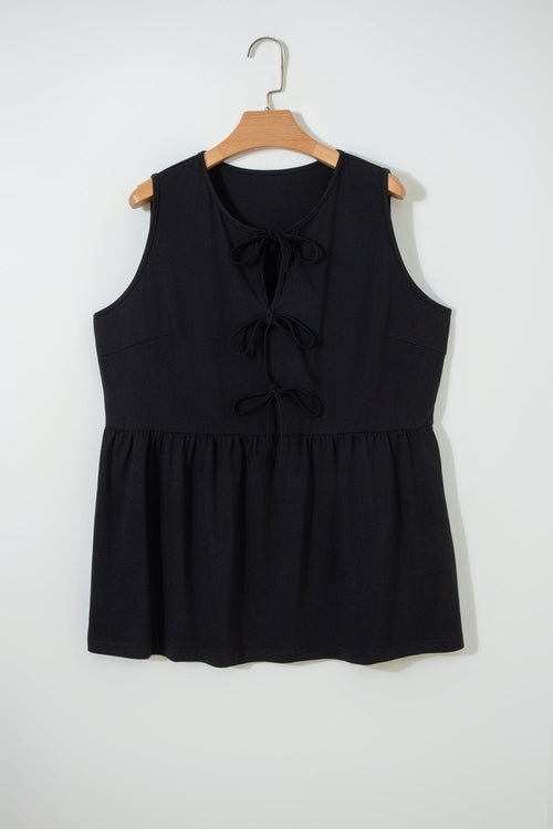 Plus size solid bow-tie peplum tank top for women by Byzantium Bay, featuring a stylish design with a flattering fit.