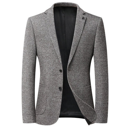 Carmine Juneberry Metropolitan Slim-Fit Blazer from Haute Edition 25, shown in a tailored dark fabric with classic lapels.