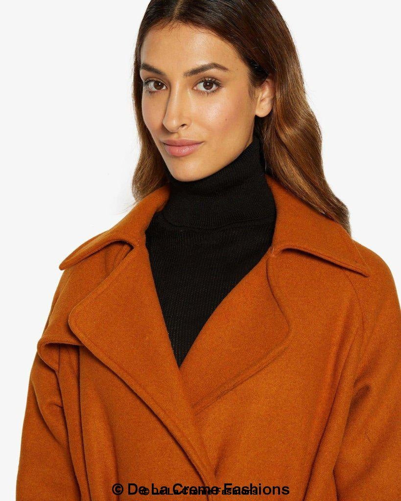 Rose Eleusis Diana wrap-around duster coat, lightweight jacket with a flowing silhouette and belt waist, shown on a model.