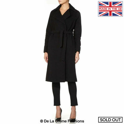Black Diana wrap-around duster coat by Rose Eleusis, stylish long jacket with belt and open front design.