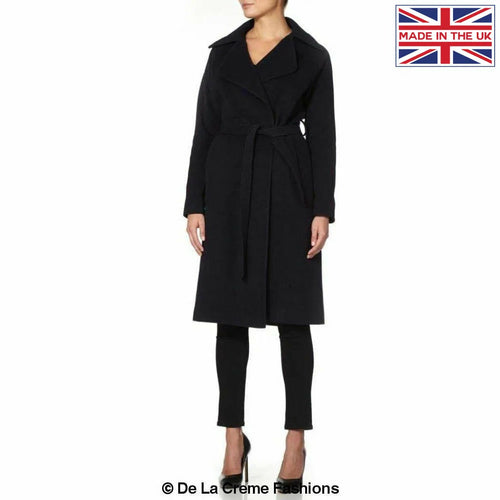 Navy Diana wrap-around duster coat by Rose Eleusis, shown on a model, featuring a stylish, flowing design and classic collar.