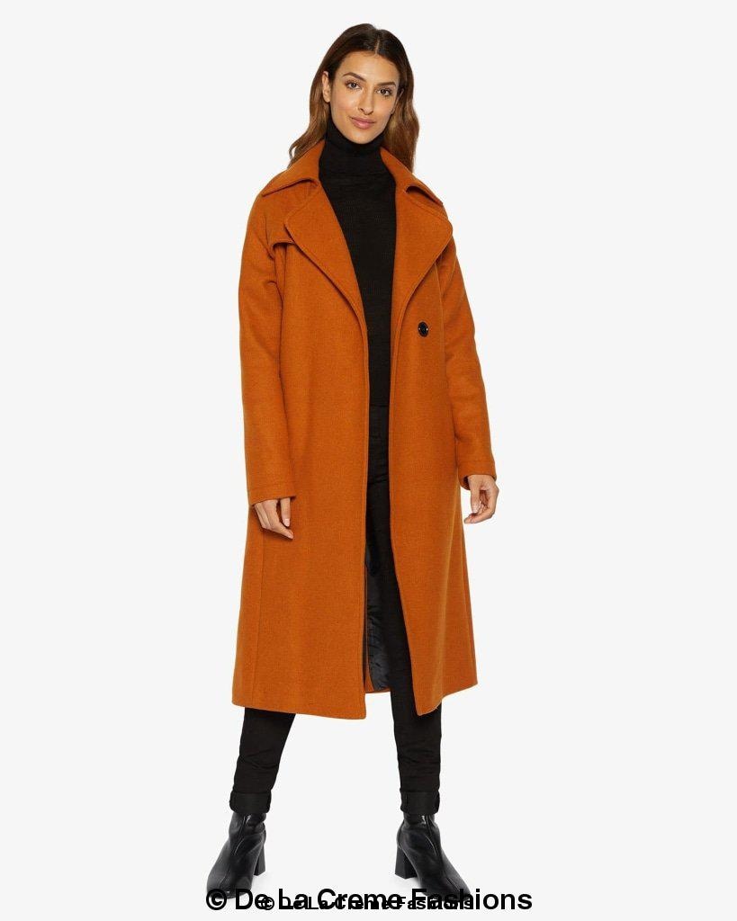 Orange Rose Eleusis Diana wrap-around duster coat with long sleeves and belt, styled for a casual or layered look.