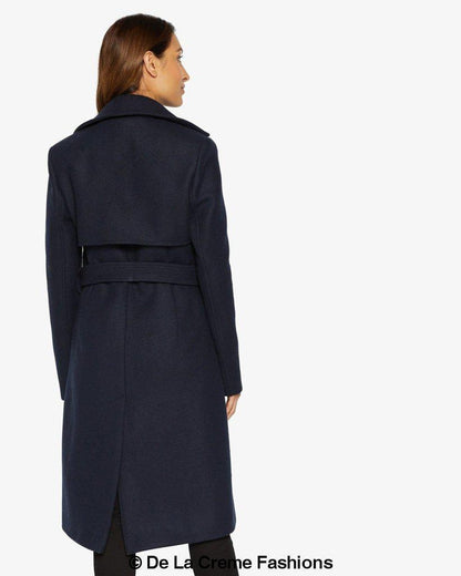 Rose Eleusis Dina lapel collar duster coat with belt, stylish long jacket in neutral fabric, shown on model.