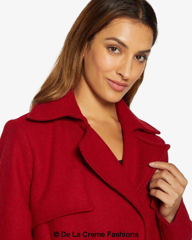Rose Eleusis Dina lapel collar duster coat with belt, long stylish jacket in a neutral fabric, shown on a model.