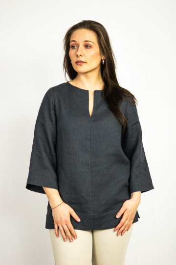 Dark plum linen oversize top by Magenta Sugarplum, showcasing relaxed fit and textured fabric in a close-up image.