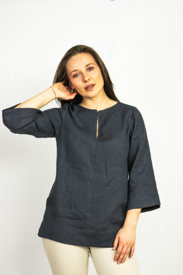 Asphalt grey linen oversize top by Magenta Sugarplum, featuring a relaxed fit and casual style, displayed on a hanger.