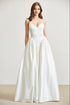 White Amphitryon Luna Bridal Maxi Dress for women, elegant white gown with flowing fabric and intricate lace details.
