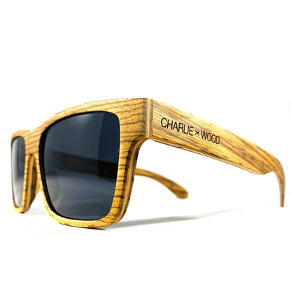 Violet Eros Druid T-shirt featuring Charlie X wood sunglasses design, casual style with graphic print on soft fabric.
