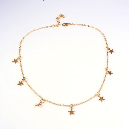Carmine Medusa fashion pentagram pendant necklace with metal star charm on a delicate chain, stylish jewelry accessory.