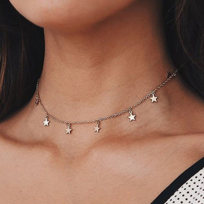 Carmine Medusa fashion pentagram pendant necklace with metal star charm on a delicate chain, stylish jewelry accessory.