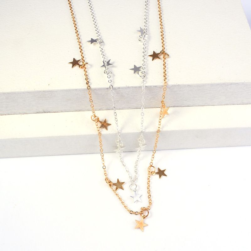 Carmine Medusa fashion simple pentagram pendant necklace with metal star charm on a chain, jewelry and watch accessory.
