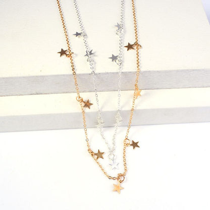Carmine Medusa fashion pendant necklace with a simple metal pentagram star charm on a chain, perfect for stylish jewelry.
