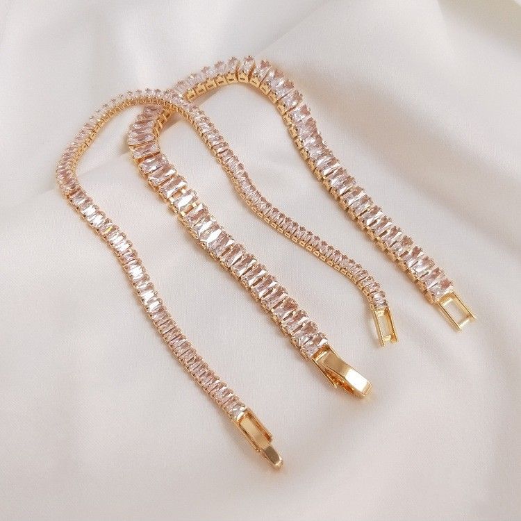 Carmine Medusa 14K gold clad rectangular T-square jewelry with sparkling zirconia, color-preserving finish, elegant design