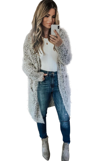 Women’s fuzzy knit cardigan with pockets by Jade, featuring a cozy, textured design and a relaxed fit for casual wear.