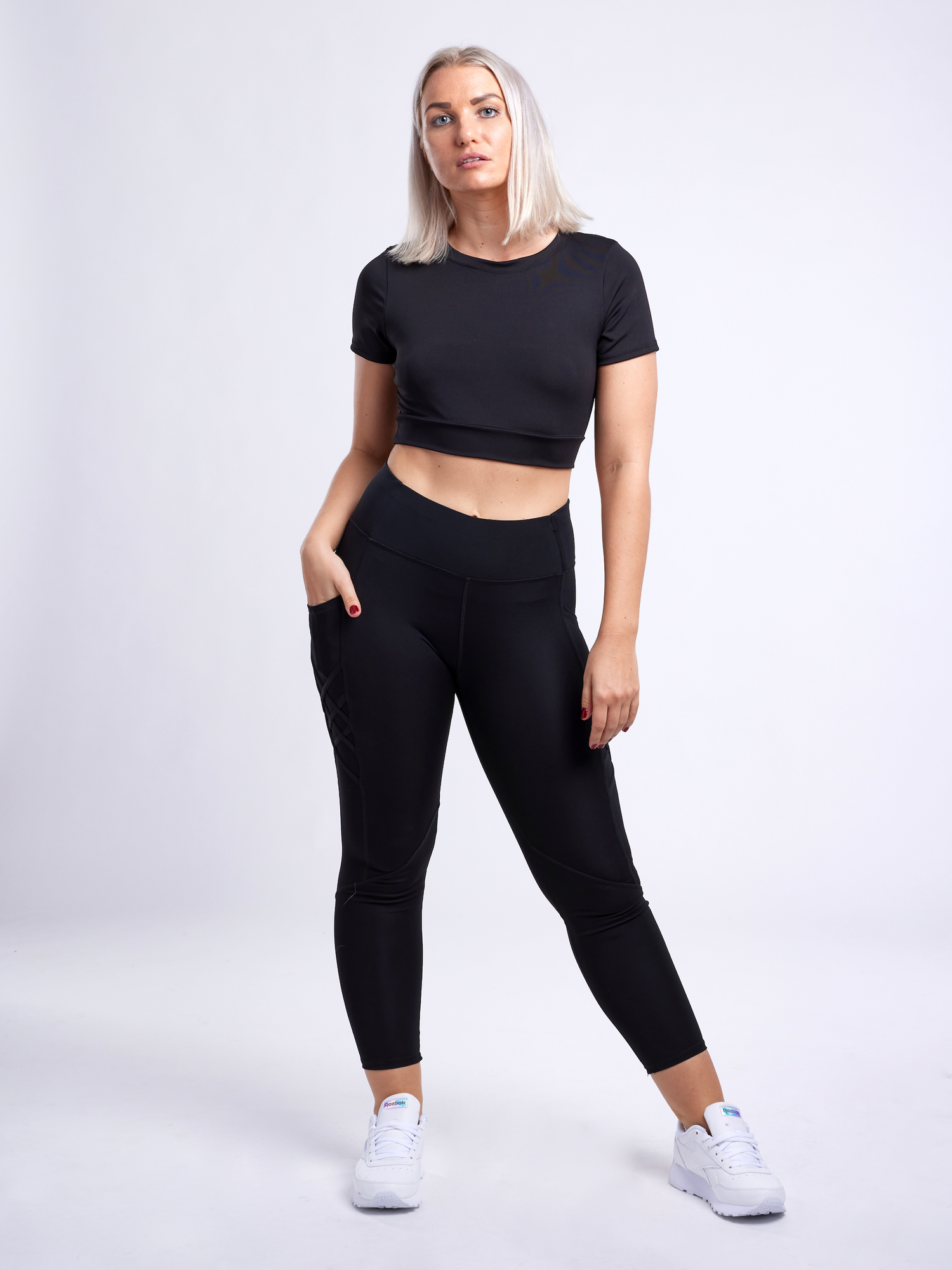 Sky Iapetus JupiterGear short-sleeve crop top, activewear with a fitted design, shown in a stylish black fabric.