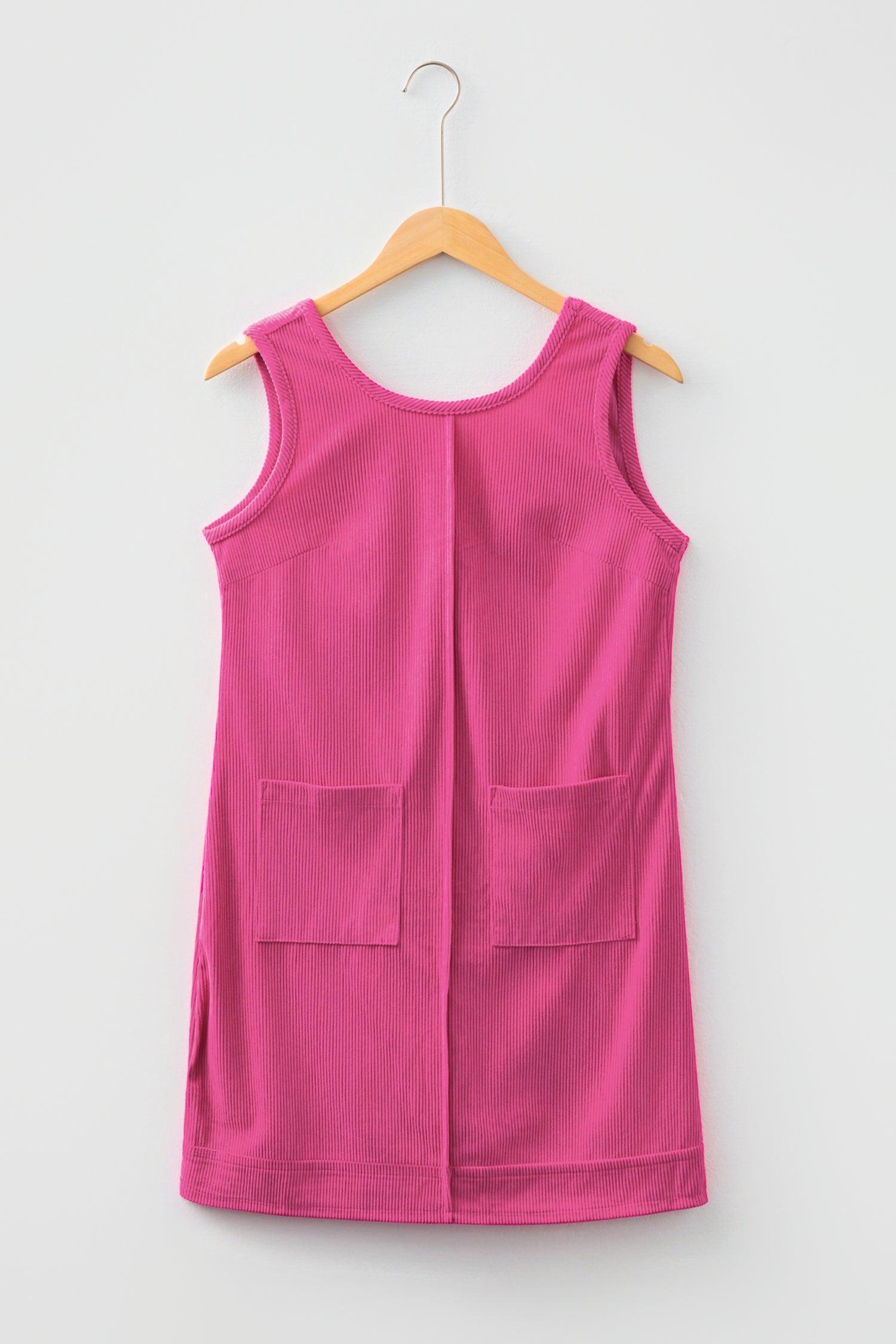 Byzantium Bay solid corduroy sleeveless mini dress with front pockets, stylish casual dress for warm weather.