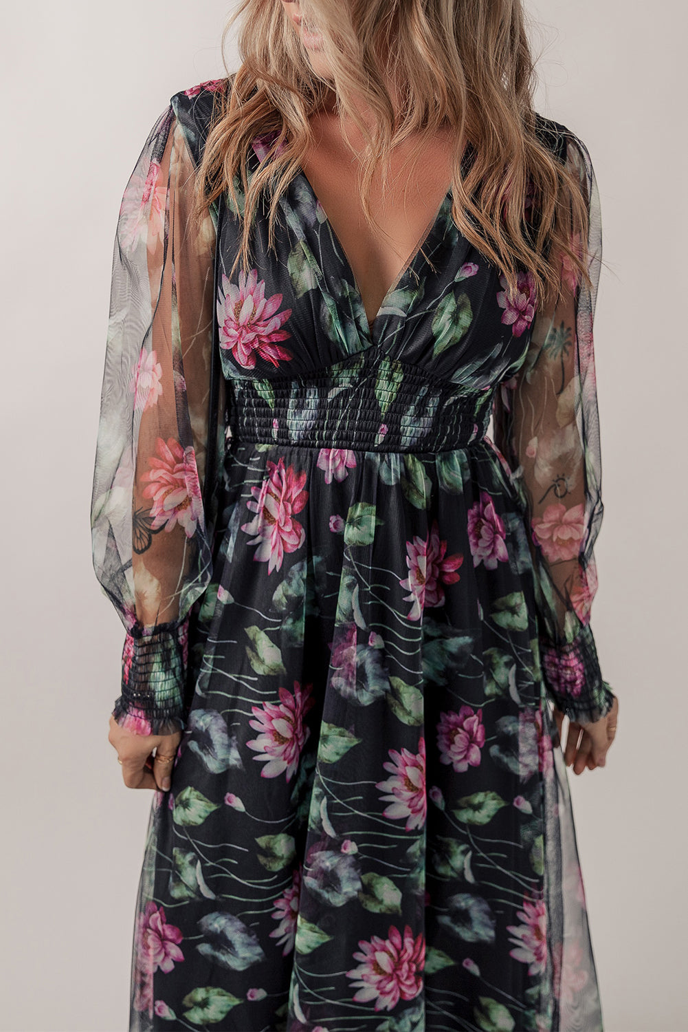 Black mesh sheer floral maxi dress with shirred high waist, by Harlequin Daisy, perfect for stylish summer wear.