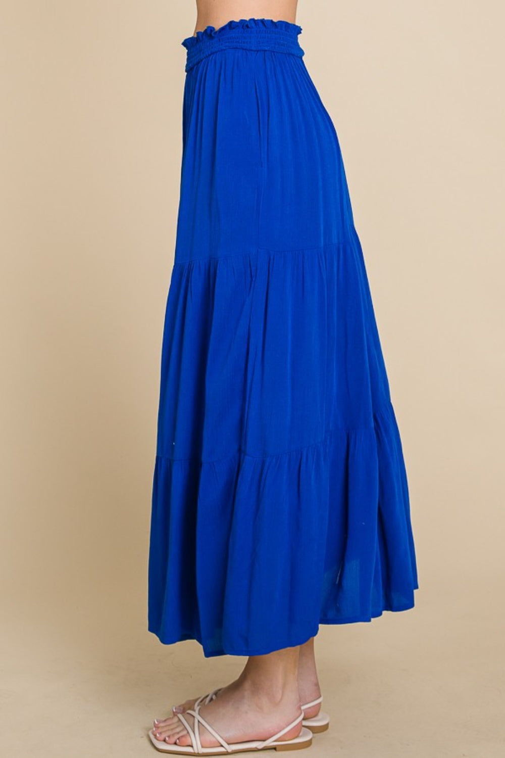 Jade Icarus Culture Code full-size frill ruched midi skirt with textured fabric and elegant design, shown in a stylish automotive setting.