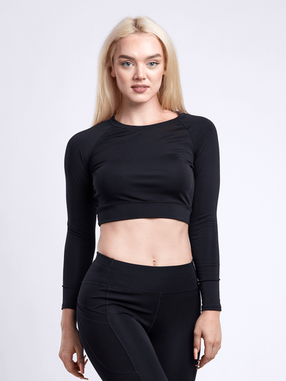 Black Lavender JupiterGear long-sleeve crop top for activewear, shown on a model, with a fitted design and stylish athletic look.