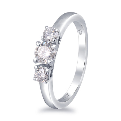 Sterling silver white moissanite 3-stone ring with sparkling stones, elegant jewelry piece by Copper Juniper