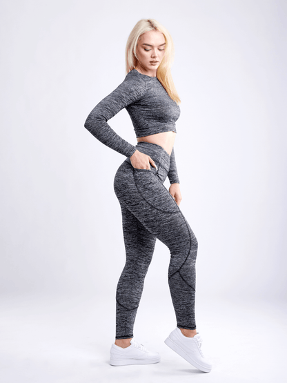 Black Lavender JupiterGear long-sleeve crop top for activewear, shown in black with a fitted design and crew neckline.