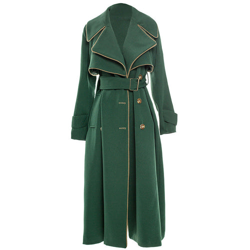 Long British style double-breasted coat by Carmine Juneberry, featuring a classic tailored design and warm fabric.